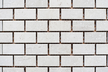 Obraz premium Ceramic tiles in the form of bricks. White cladding as a sample in the store. Flat lay frame