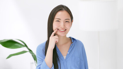 女性・歯