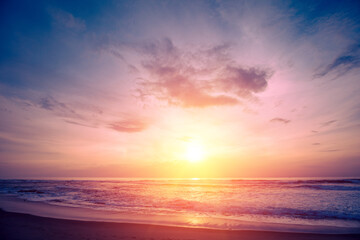Fototapeta premium Seascape in the evening. Sunset over the sandy beach. Nature landscape