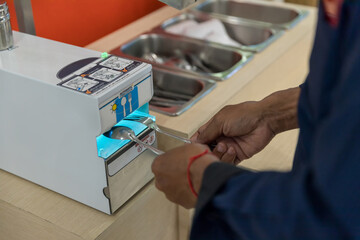 Automatic sterilizer for spoon In the food court Measures to prevent COVID-19 outbreak