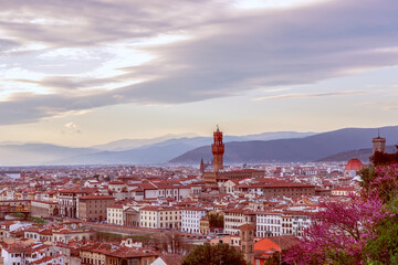 Fototapeta na wymiar Sunset over Florence and famous Palazzo Vecchio. Tuscany, Italy
