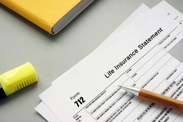  Financial concept about Form 712 Life Insurance Statement with phrase on the piece of paper.