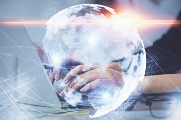 Multi exposure of woman hands typing on computer and business theme hologram drawing. Success concept.