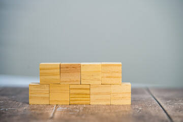 Blank wooden square cube mock up, two horizontal rows four and five blocks  with a simple background