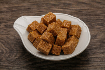 Cane sugar cubs in the bowl