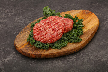 Raw beef burger cutlet for cooking