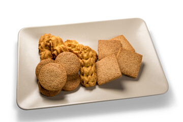 Gluten free cookies, different types of Italian biscuits  in the plate isolated on the white