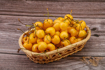 Sweet ripe yellow cherry heap