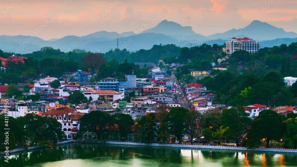 Wall mural kandy, sri lanka. lake in kandy. time-lapse of a sunset over the former capital of sri lanka. panora