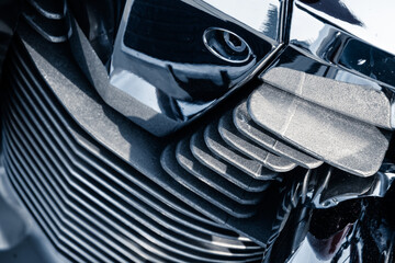 Motorcycle engine with chrome details, close-up