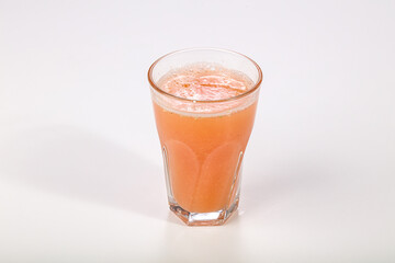 Grapefruit fresh juice in the glass