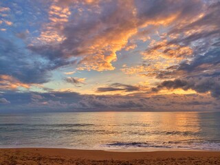 View of sea sand sun on evening