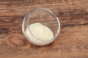 Fototapeta na wymiar Sour cream in the bowl