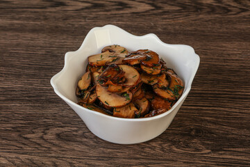Roasted champignon with herbs and spices