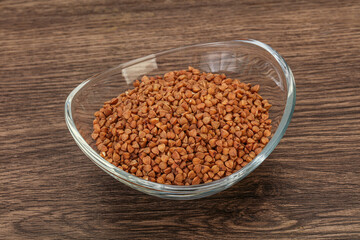 Raw buсkwheat cereal in the bowl