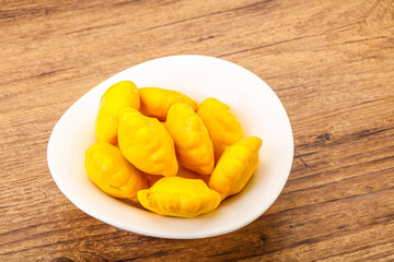 Marinated patissons in the bowl