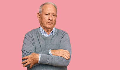 Senior caucasian man wearing casual clothes skeptic and nervous, disapproving expression on face...