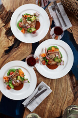 Steak on the bone. tomahawk steak On a white background. Top view. Free copy space.