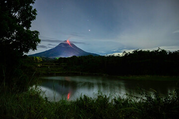 Mount Merapi is the most active volcano in Central Java and Yogyakarta, Indonesia. Merapi lenticular clouds, cloud rings and lava droplets Mount Merapi is the most active volcano in Central Java and Y