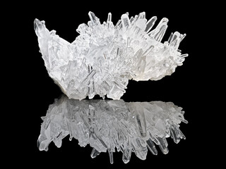Amazing pure Quartz Crystal cluster gemstone closeup macro isolated on black background. Natural...