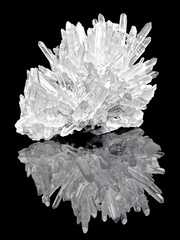 Amazing pure Quartz Crystal cluster gemstone closeup macro isolated on black background. Natural rare white mineral rough stone. Beautiful crystals arrangement