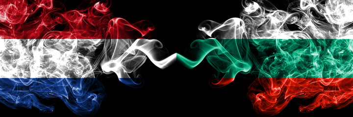 Netherlands vs Bulgaria, Bulgarian smoky mystic flags placed side by side. Thick colored silky abstract smoke flags.