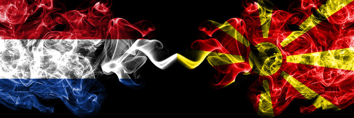 Netherlands vs Macedonia, Macedonian smoky mystic flags placed side by side. Thick colored silky...
