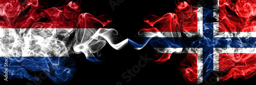 Netherlands vs Norway, Norwegian smoky mystic flags placed side by side. Thick colored silky abstract smoke flags.