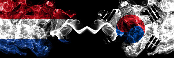 Netherlands vs South Korea, Korean smoky mystic flags placed side by side. Thick colored silky abstract smoke flags.