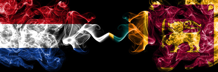 Netherlands vs Sri Lanka smoky mystic flags placed side by side. Thick colored silky abstract smoke flags.