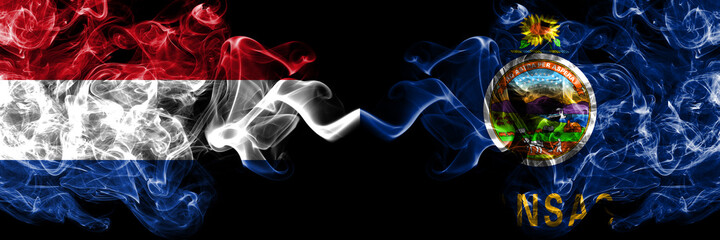 Netherlands vs United States of America, America, US, USA, American, Kansas smoky mystic flags placed side by side. Thick colored silky abstract smoke flags.