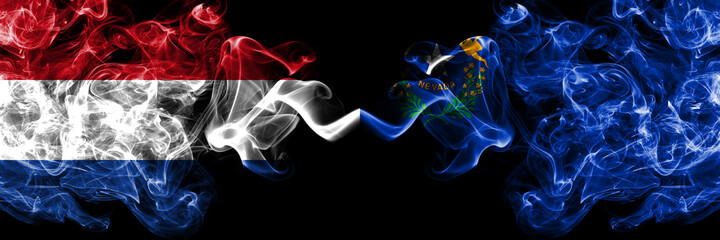 Netherlands vs United States of America, America, US, USA, American, Nevada smoky mystic flags placed side by side. Thick colored silky abstract smoke flags.