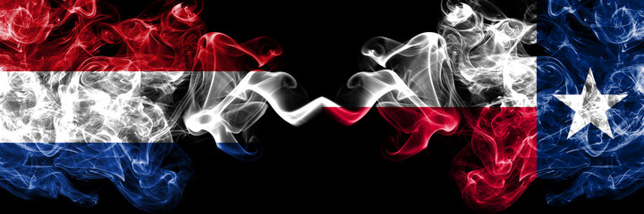 Netherlands vs United States of America, America, US, USA, American, Texas smoky mystic flags placed side by side. Thick colored silky abstract smoke flags.
