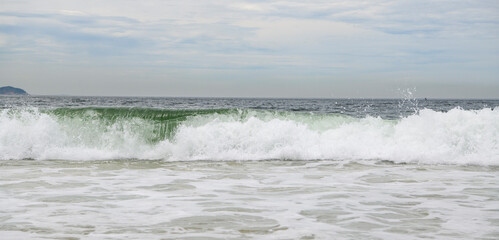 Ocean surf on the beach of Copacabana. Rio de Janeiro, February 2020ю