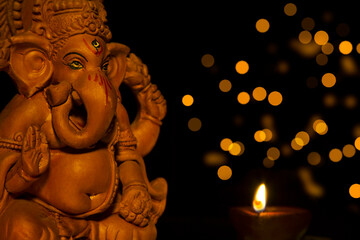 idol of lord ganesha with sweets 	