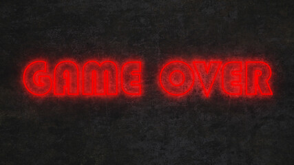 neon text game over on black concrete wall