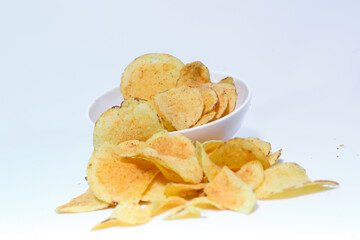 Delicious potato chips, isolated on white background 