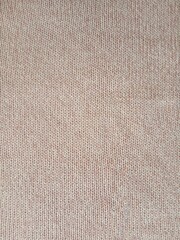 Pink knitting wool pattern background and texture
