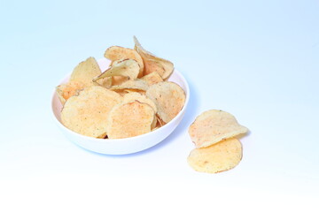 Delicious potato chips, isolated on white background 