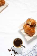 cup of coffee and croissant