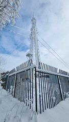 communication tower in the snow