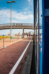 Fototapeta na wymiar View of Langeoog train in the middle of the summer season