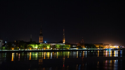 Riga city  panoramic view across Daugava river at night