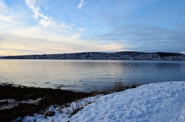 tromsoe city island in northern Norway on a blue cold winter day