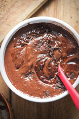 Making chocolate chilli brownies. Mixing batter with spatula
 - obrazy, fototapety, plakaty
