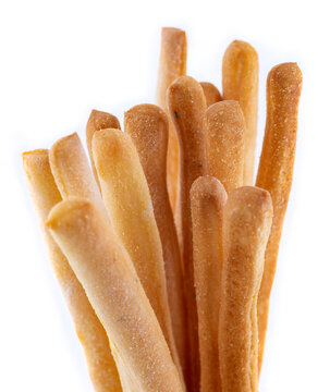 Gressini breadsticks made of wheat flour isoltaed on white background. Crispy bread from France