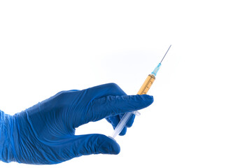 Mans hand in blue glove holds syringe isolated on white, copy space