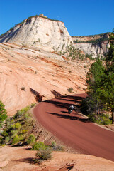 motorcycle riding in Checkerboard Mesa of Zion Canyon National Park