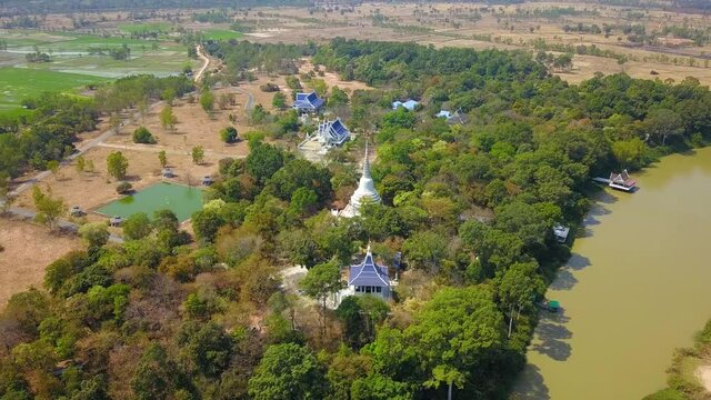 4K-Top view from flying drone over Wat Phra phut tha bat,temple and pagoda  in Maha chana chai town, Yasothon  province,Thailand,ASIA.
