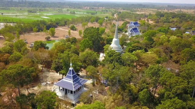 4K-Top view from flying drone over Wat Phra phut tha bat,temple and pagoda  in Maha Chana Chai town, Yasothon  province,Thailand,ASIA.